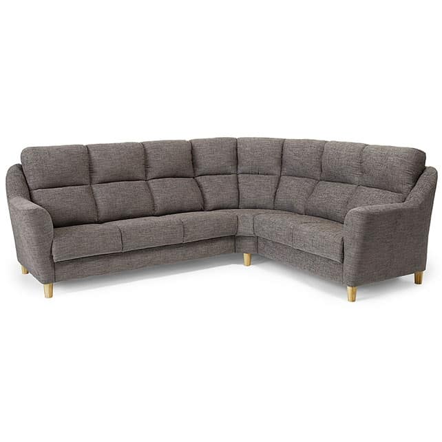 The Everest is a grey, L-shaped sectional sofa featuring tufted back cushions and light wooden legs, shown against a white background.