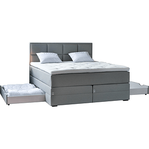 The Borgholm förvaring is a modern gray upholstered bed featuring a tall tufted headboard, two white pillows, and convenient pull-out storage drawers on both sides of the base.